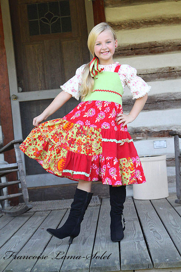 Girl's apron patchwork twirl dress handmade with floral corduroys in the shades green, red and orange Winter Bouquet