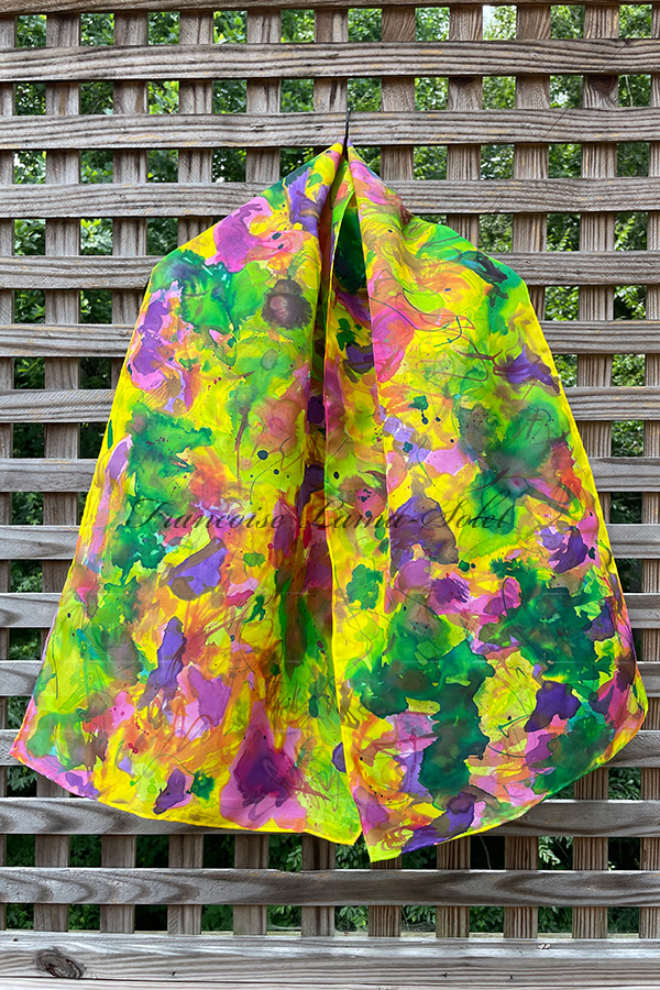 Women's colorful wearable art silk scarf hand painted with an abstract floral expressive painting in different shades of yellow, orange, green, purple and pink - Be Bold