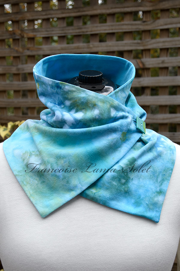 Women's wearable art hand ice dyed cotton neck warmer scarf with button in different shades of blue, turquoise, aqua, white and green - Caribbean Cruise